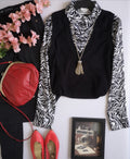 Blusa con chaleco pegado incluye collar