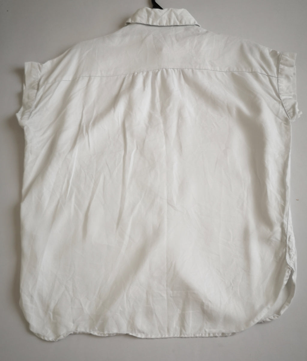 Blusa tipo over size con shorts