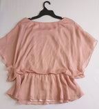 Blusa tipo peplum bordada