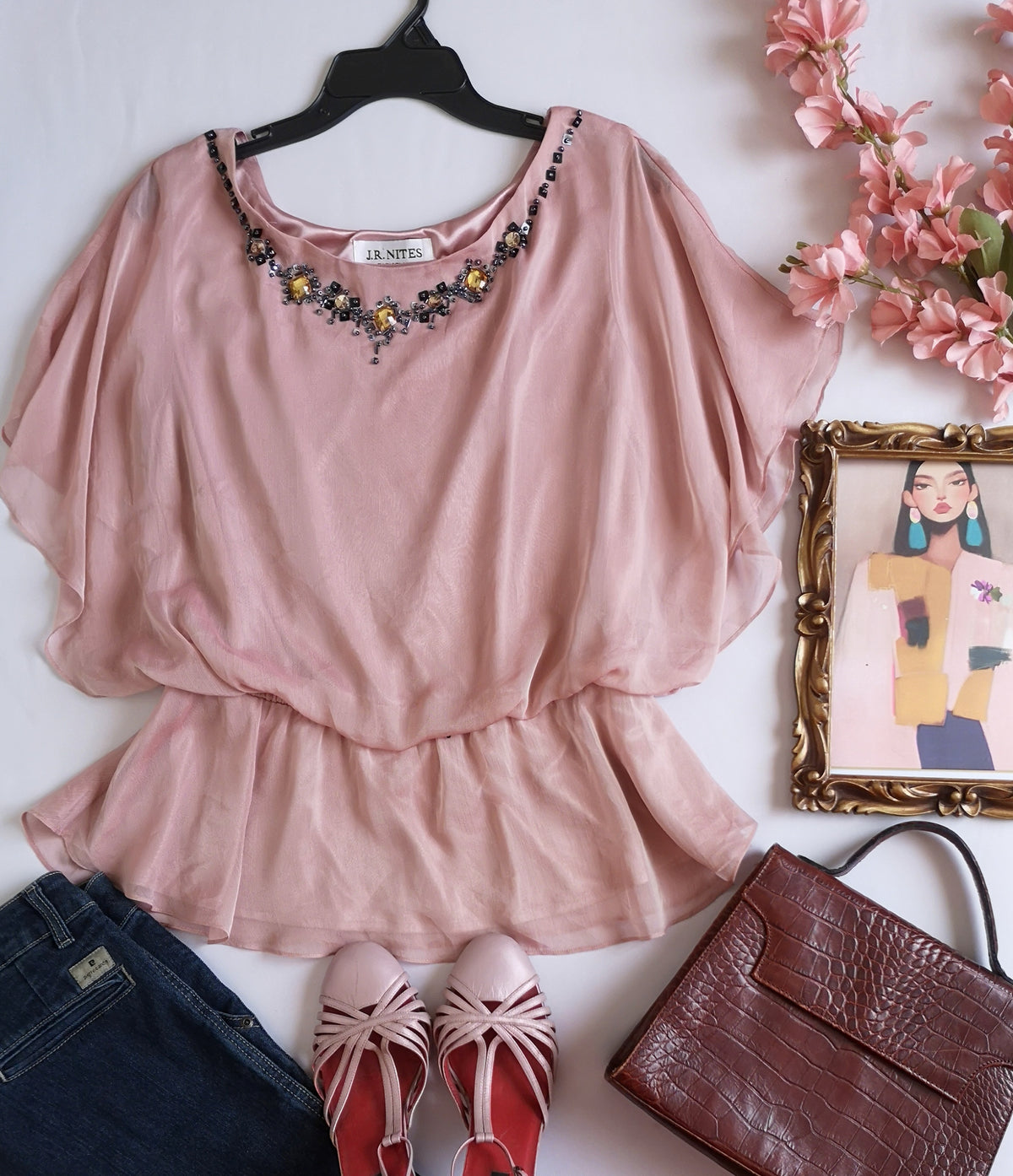 Blusa tipo peplum bordada