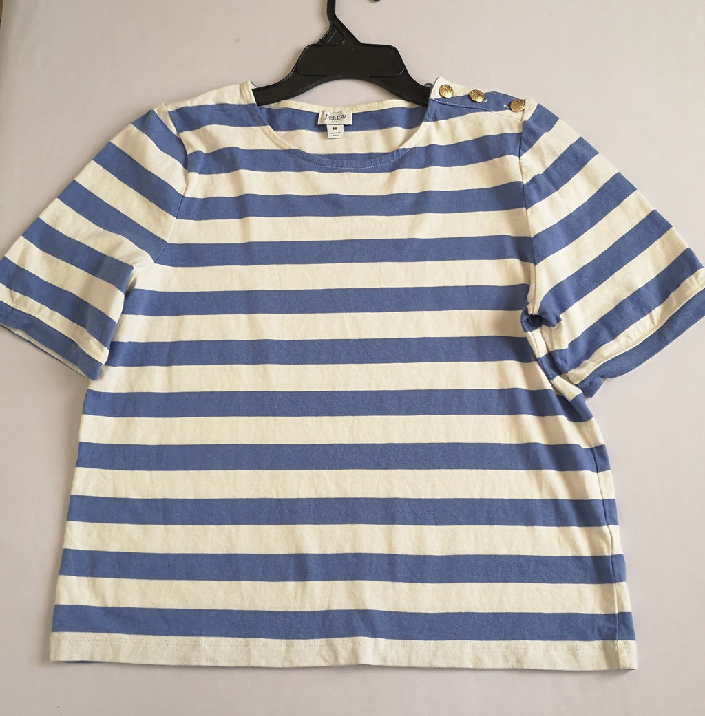 Pantalón tipo palazzo y blusa con botones en el hombro