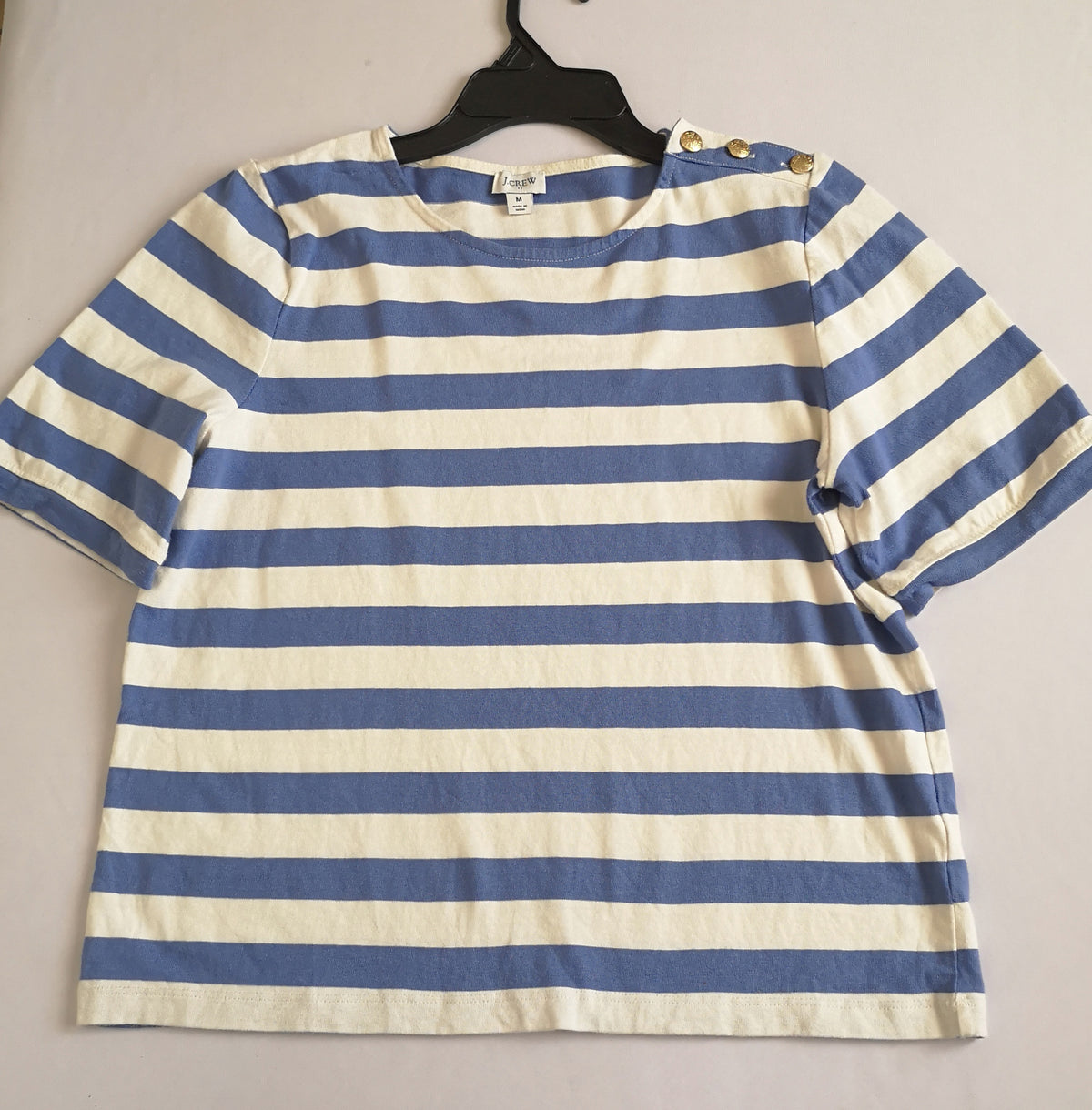 Pantalón tipo palazzo y blusa con botones en el hombro
