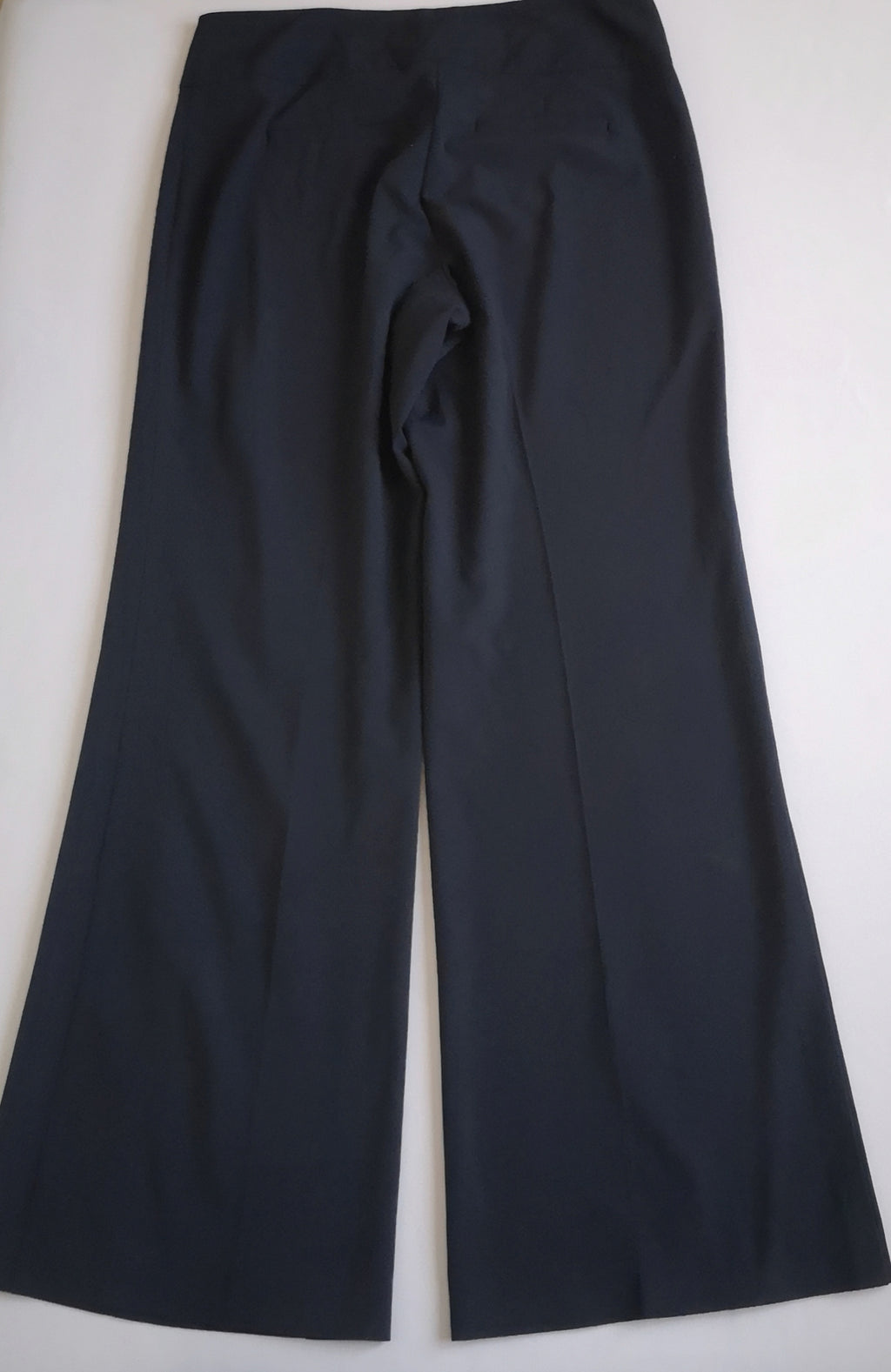 Pantalón tipo palazzo y blusa con botones en el hombro
