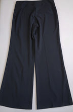 Pantalón tipo palazzo y blusa con botones en el hombro
