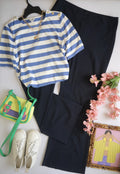 Pantalón tipo palazzo y blusa con botones en el hombro