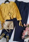 Blusa con encaje y pantalón wide leg