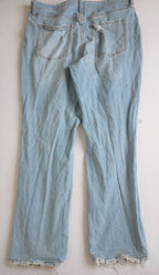 Maxiblusa con bolitas y jeans estilo vintage de los 90s