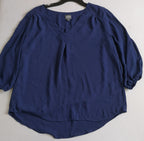 Blusa manga 3 /4 con pantalón corte recto