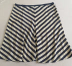 Falda midi de seda con blusa cuello alto