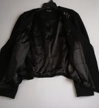 Chaqueta bordada asimétrica