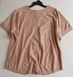 Blusa con botones atrás con pantalón corte recto