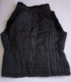 Chaleco reversible con blusa manga larga