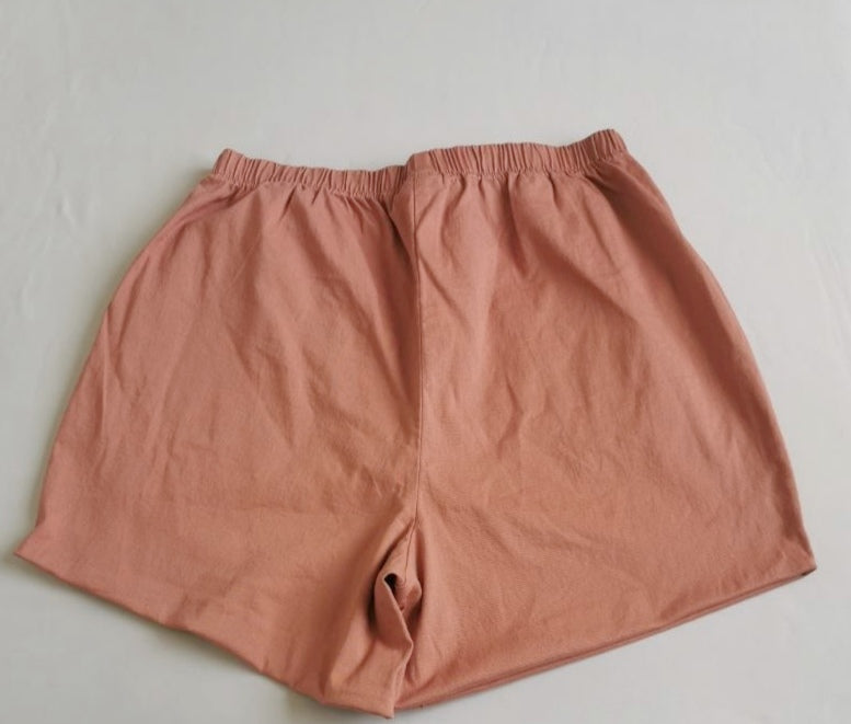 Blusa asimétrica y short con bolsas ⚓