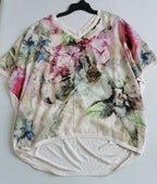 Blusa asimétrica y short con bolsas ⚓
