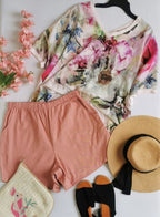 Blusa asimétrica y short con bolsas ⚓