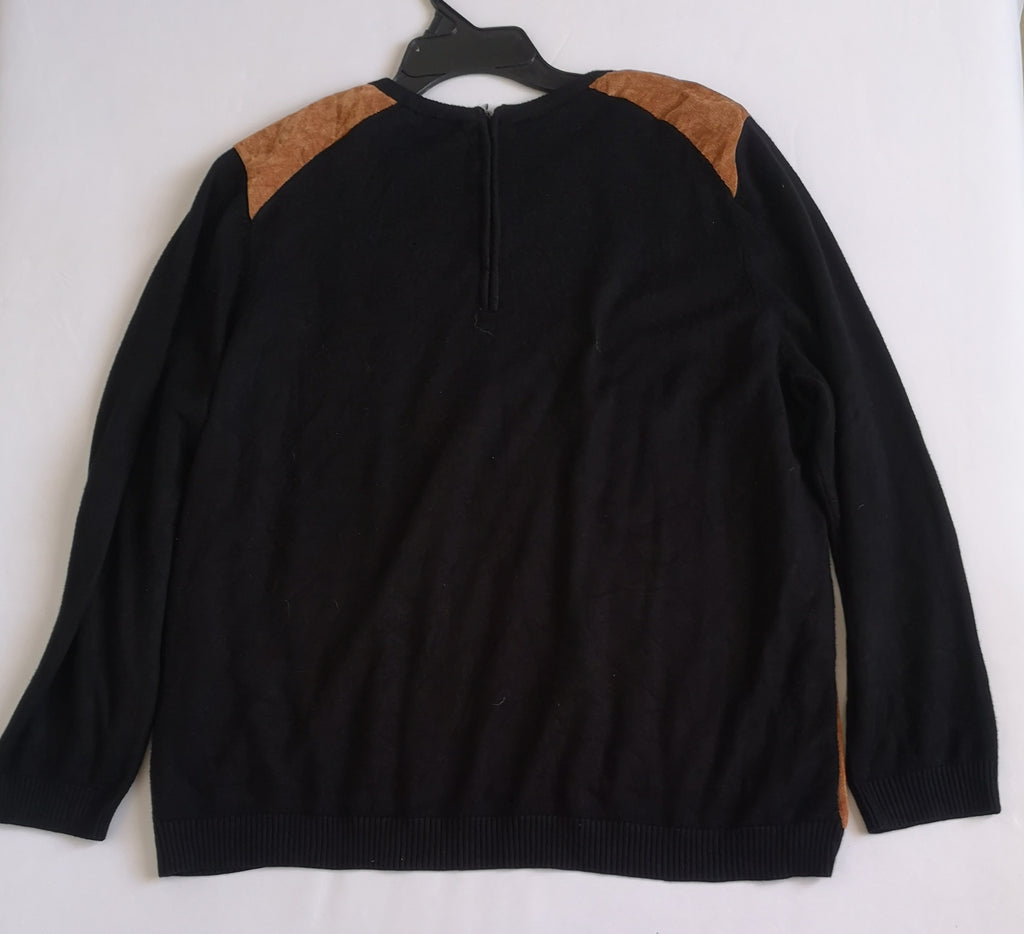 Sueter con zipper atrás y falda con adorno abajo