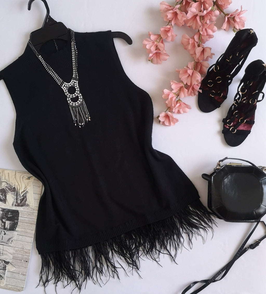 Blusa con plumas abajo incluye collar