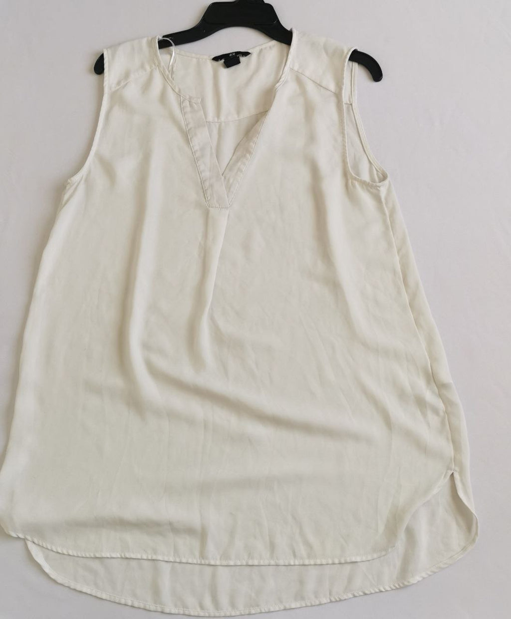 Pantalón corte recto con blusa sin mangas