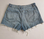 Blusa de chifon y short con zipper a los lados
