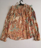 Blusa de chifon y short con zipper a los lados