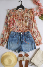 Blusa de chifon y short con zipper a los lados