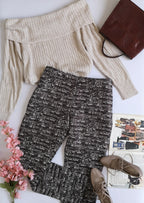 Pantalón corte recto con blusa hombros descubiertos