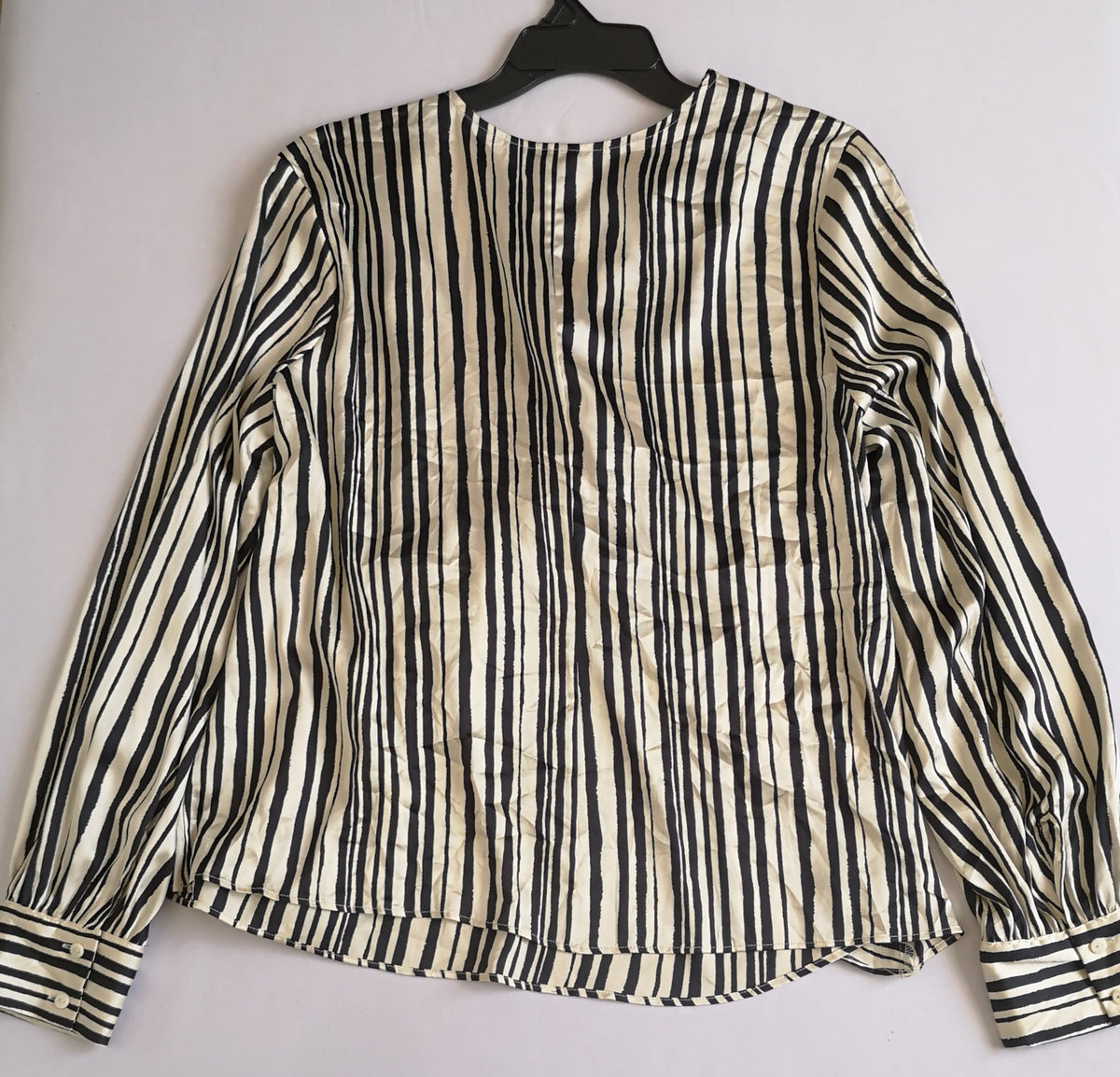 Blusa traslapada tipo seda