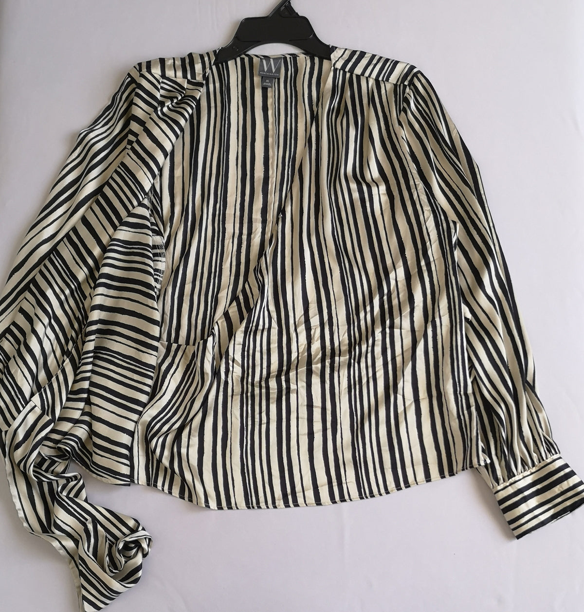 Blusa traslapada tipo seda